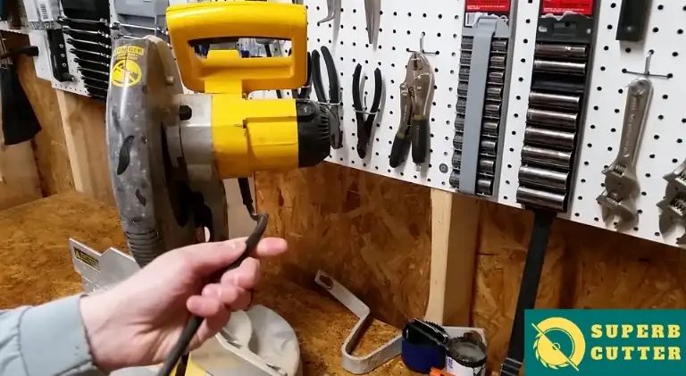 fixing the cord of the miter saw
